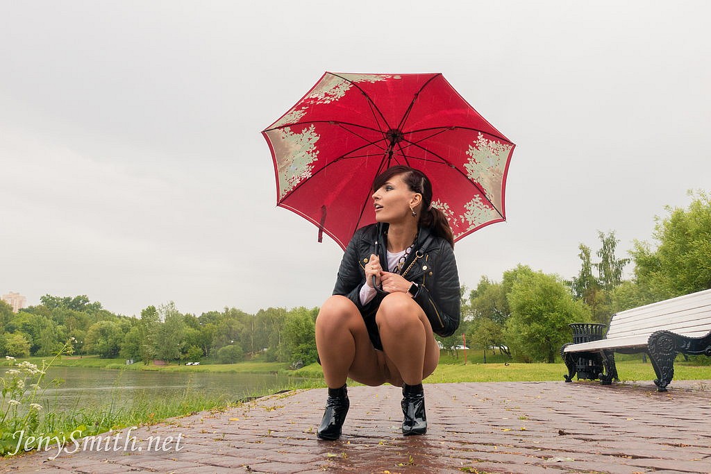Jeny Smith posing in seamless pantyhose with no skirt in the rain
