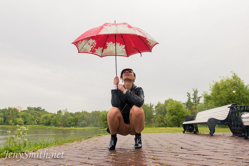 Jeny Smith posing in seamless pantyhose with no skirt in the rain