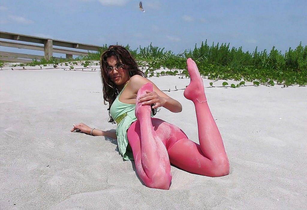 Nasty amateur girls posing outdoor in their colored pantyhose