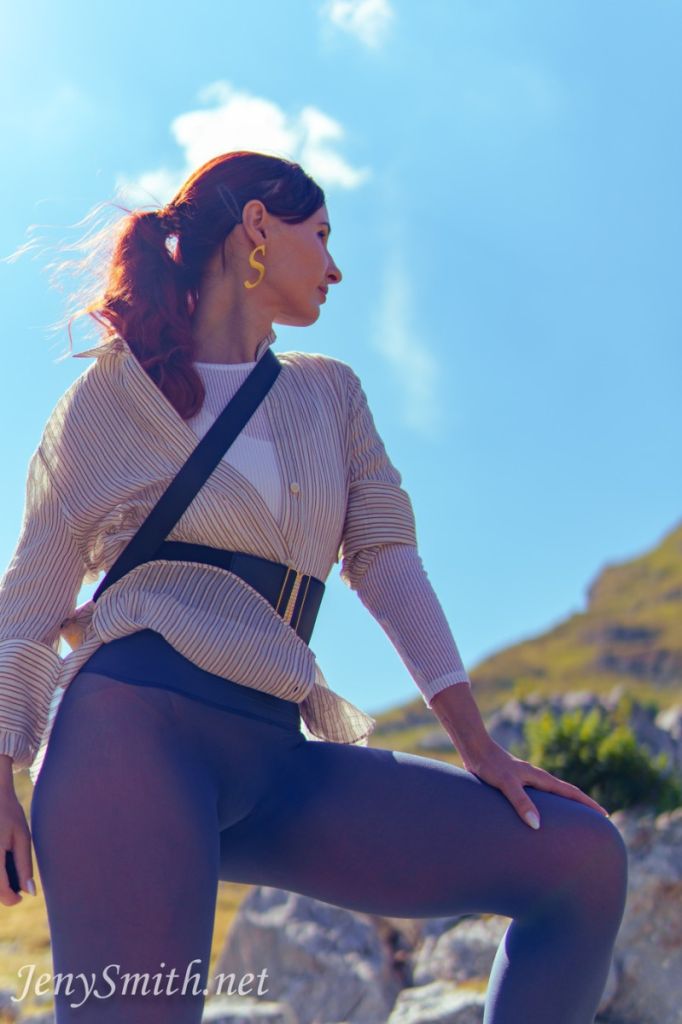 Jeny Smith wears blue seamless pantyhose without panties while traveling in the mountains